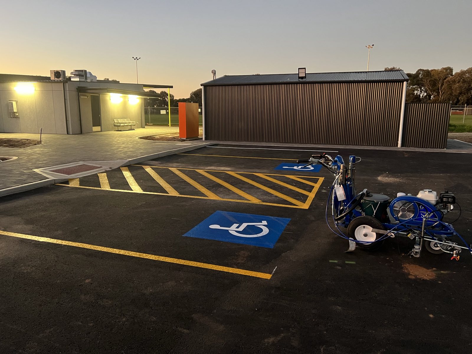 Accessible (DDA) parking bay set-out and line marking in progress